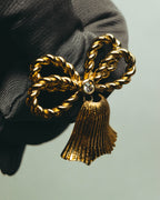 "Christian Dior" 80's-90's Gold tone ribbon tassel brooch