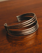 "PHILIPPE AUDIBERT" Sculptural silver tone cuff bracelet