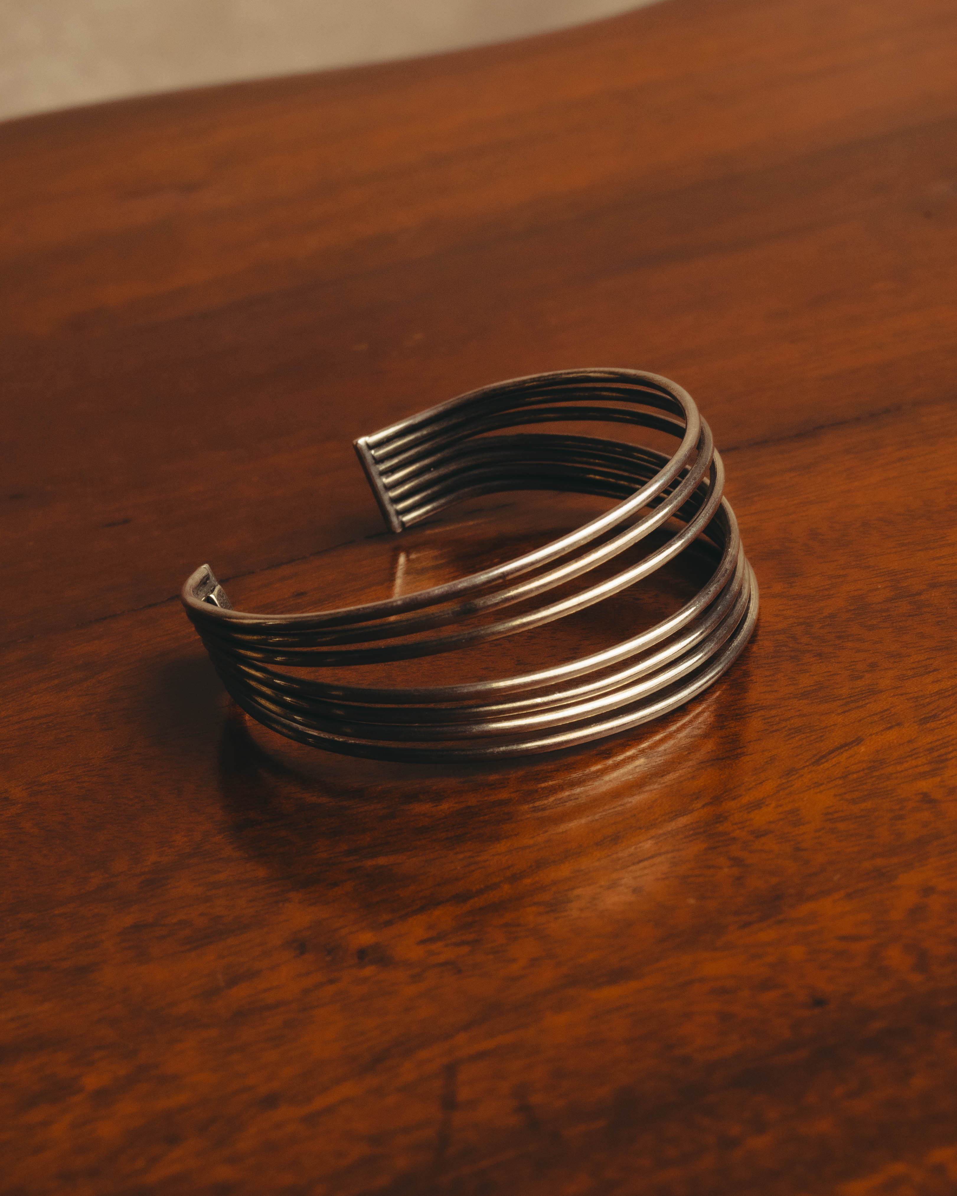 "PHILIPPE AUDIBERT" Sculptural silver tone cuff bracelet