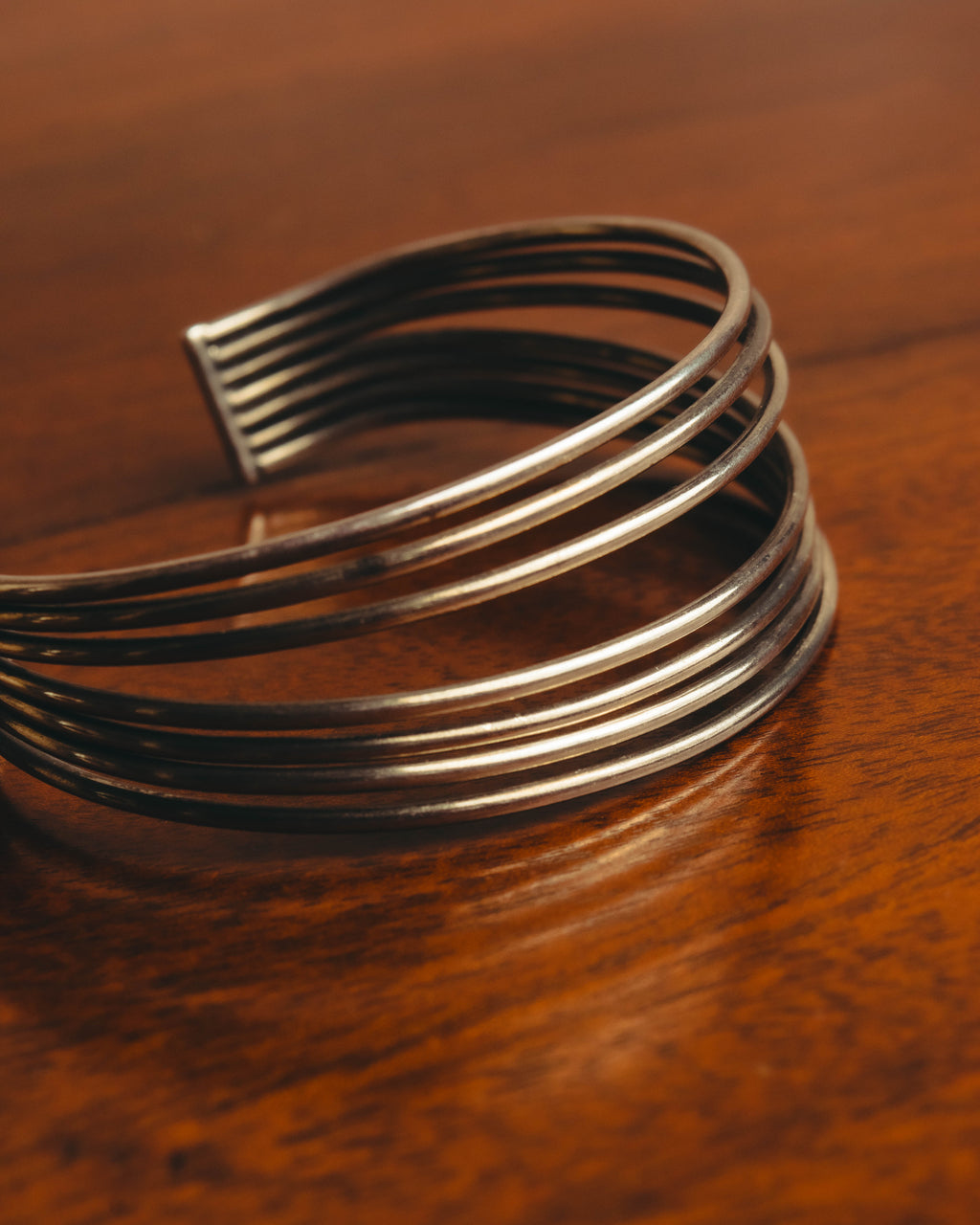 "PHILIPPE AUDIBERT" Sculptural silver tone cuff bracelet
