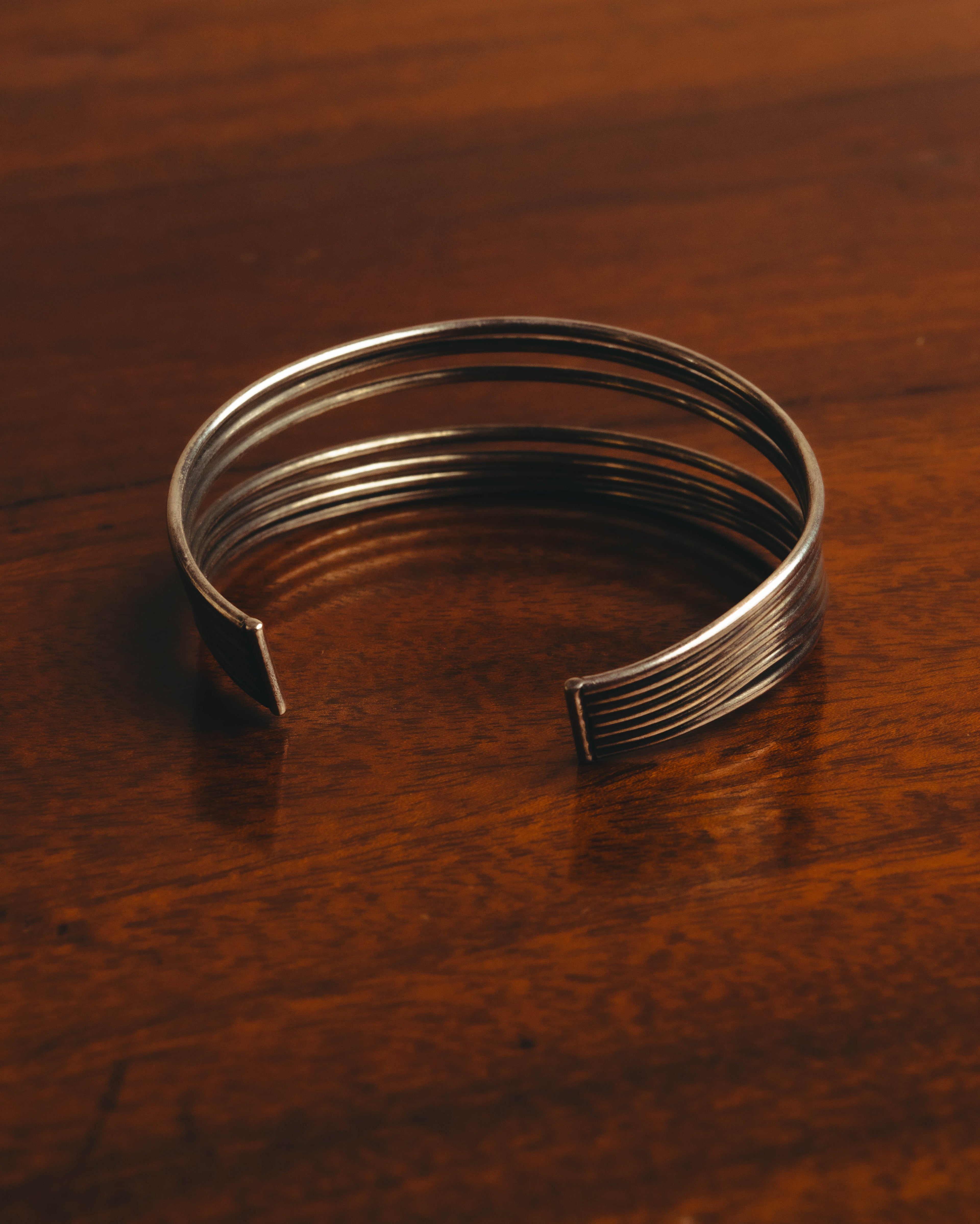 "PHILIPPE AUDIBERT" Sculptural silver tone cuff bracelet