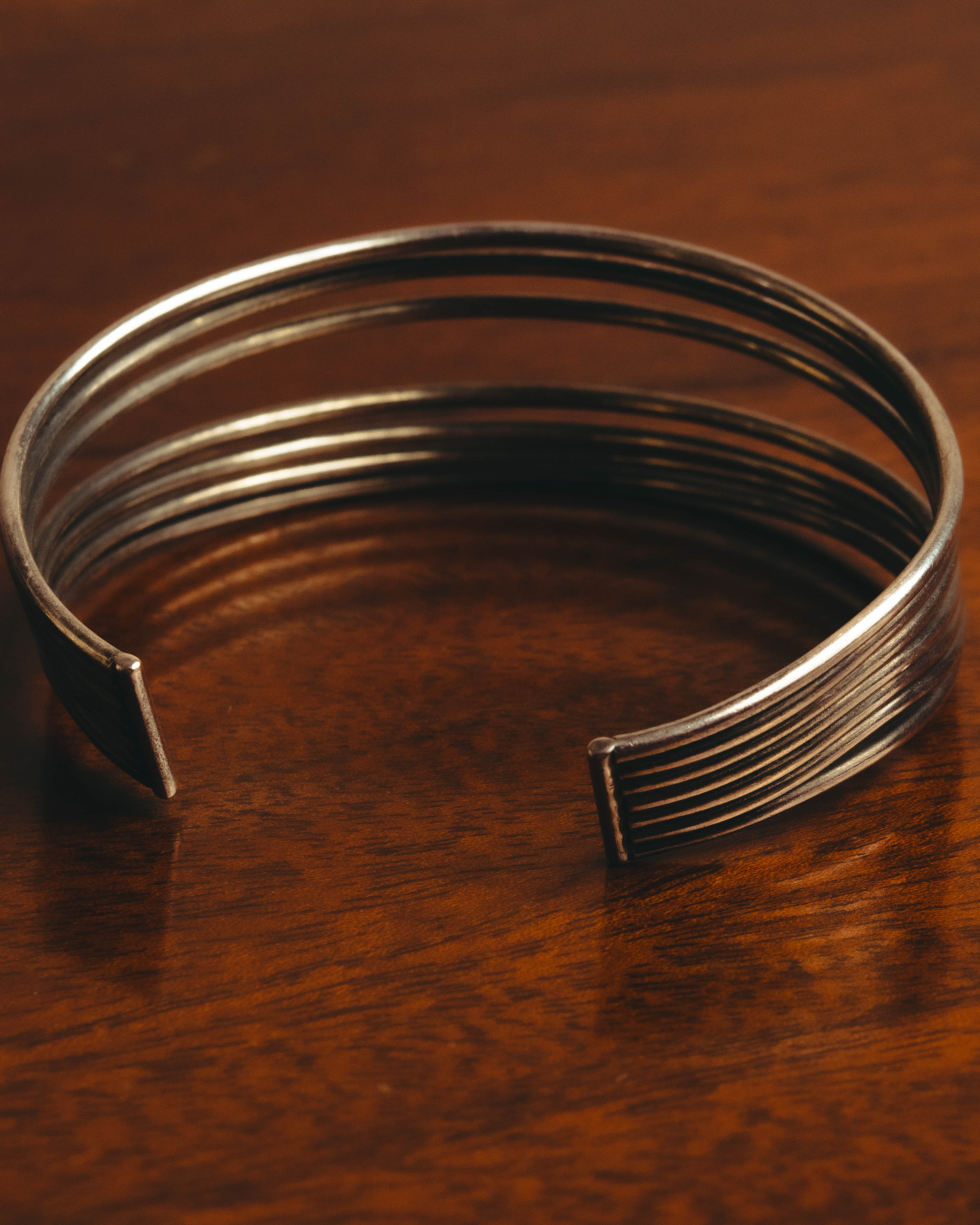 "PHILIPPE AUDIBERT" Sculptural silver tone cuff bracelet