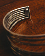 "PHILIPPE AUDIBERT" Sculptural silver tone cuff bracelet