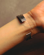 "PHILIPPE AUDIBERT" Sculptural silver tone cuff bracelet