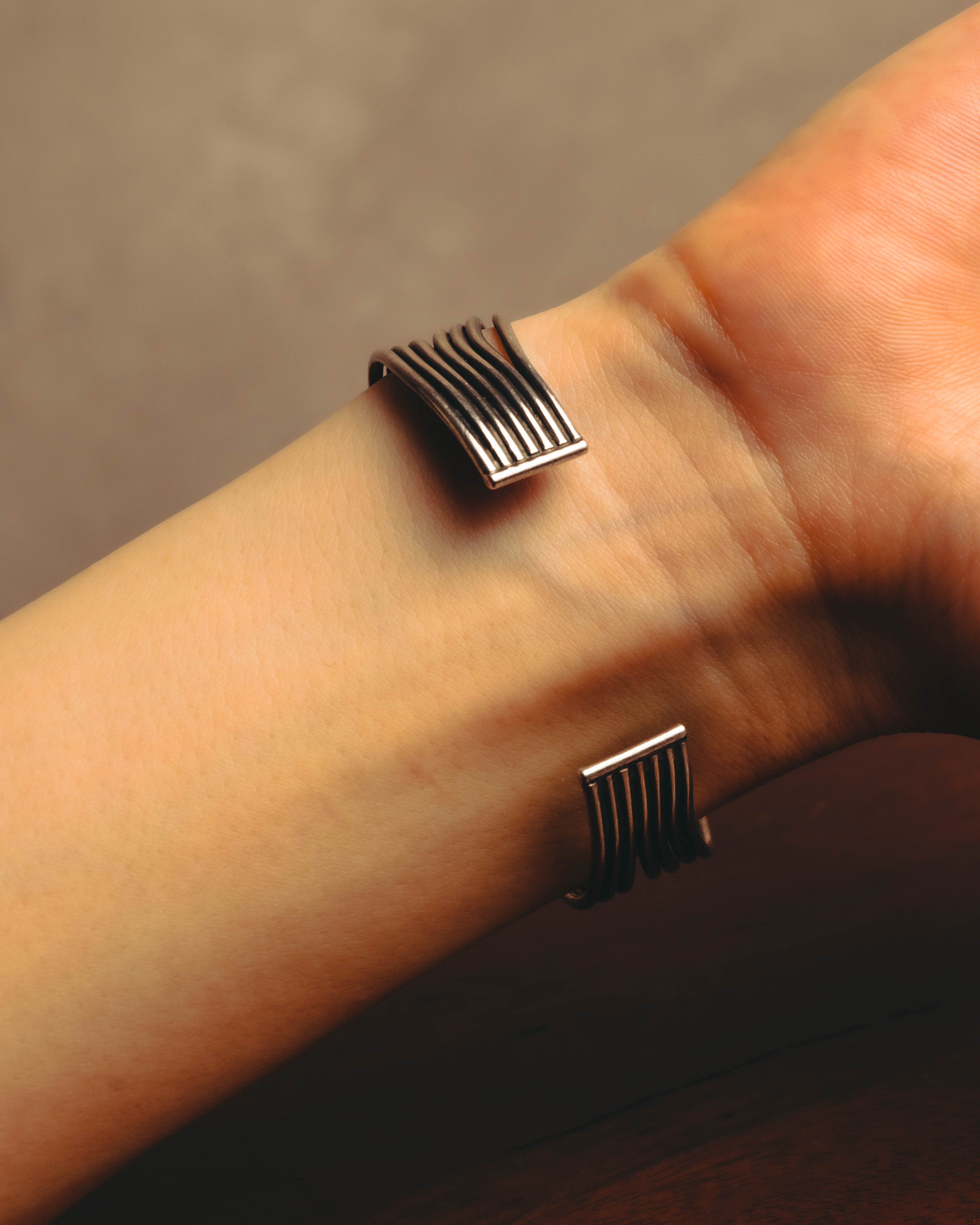 "PHILIPPE AUDIBERT" Sculptural silver tone cuff bracelet