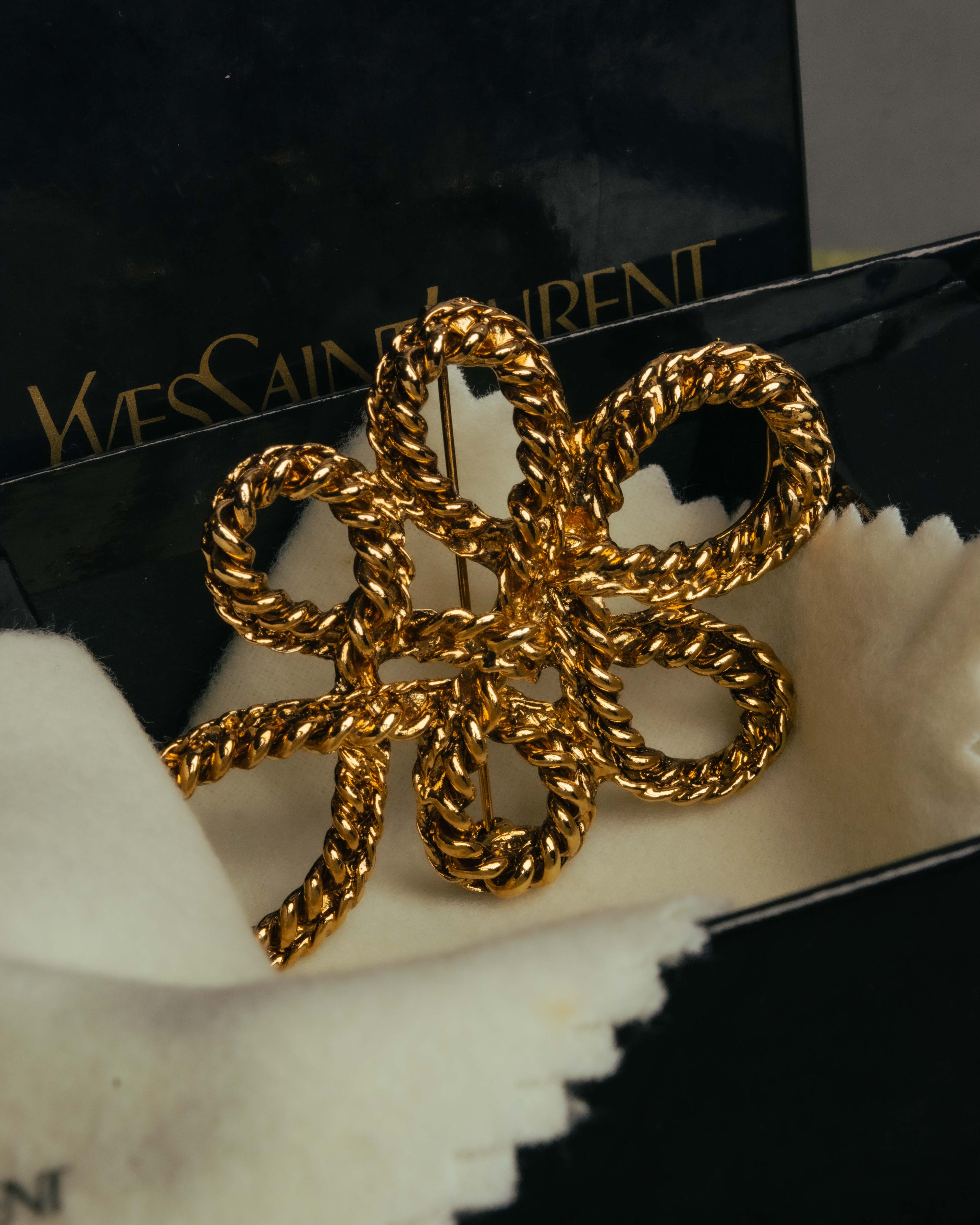 “Yves Saint Laurent” 90’s Gold rope motif flower brooch