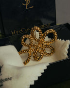 “Yves Saint Laurent” 90’s Gold rope motif flower brooch