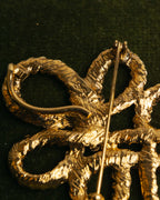 “Yves Saint Laurent” 90’s Gold rope motif flower brooch