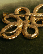 “Yves Saint Laurent” 90’s Gold rope motif flower brooch