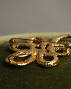 “Yves Saint Laurent” 90’s Gold rope motif flower brooch