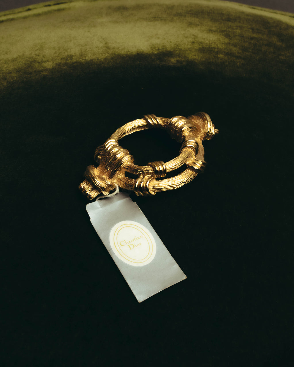 "Christian Dior" 80's-90's Sculptural gold tone ribbon brooch