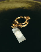 "Christian Dior" 80's-90's Sculptural gold tone ribbon brooch