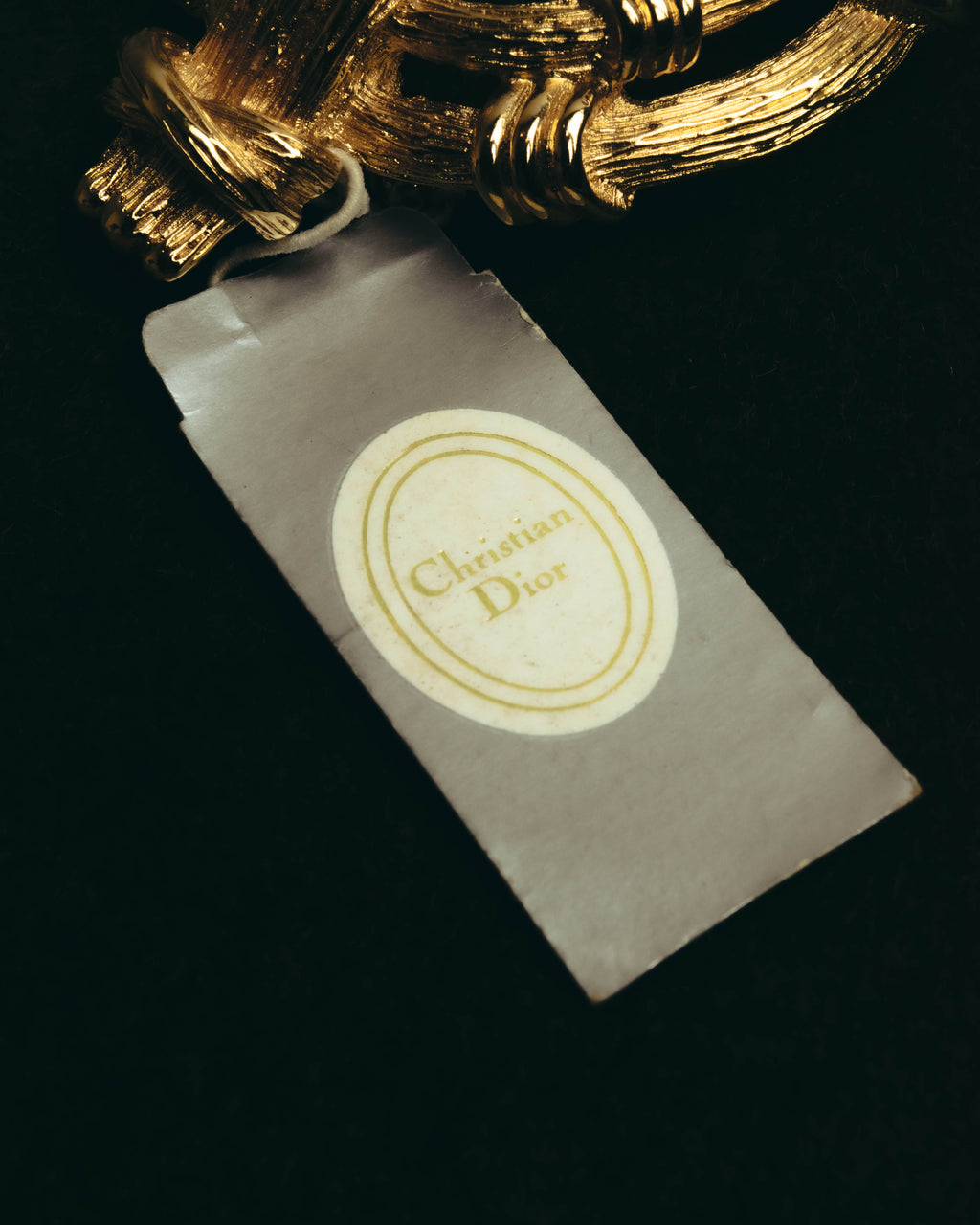 "Christian Dior" 80's-90's Sculptural gold tone ribbon brooch