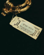 "Christian Dior" 80's-90's Sculptural gold tone ribbon brooch
