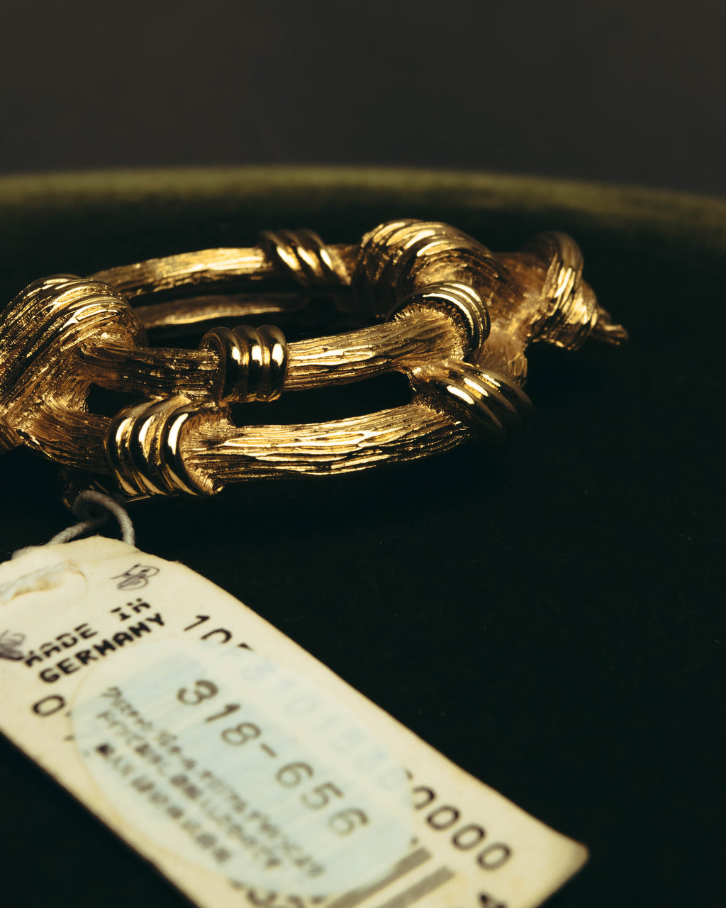 "Christian Dior" 80's-90's Sculptural gold tone ribbon brooch