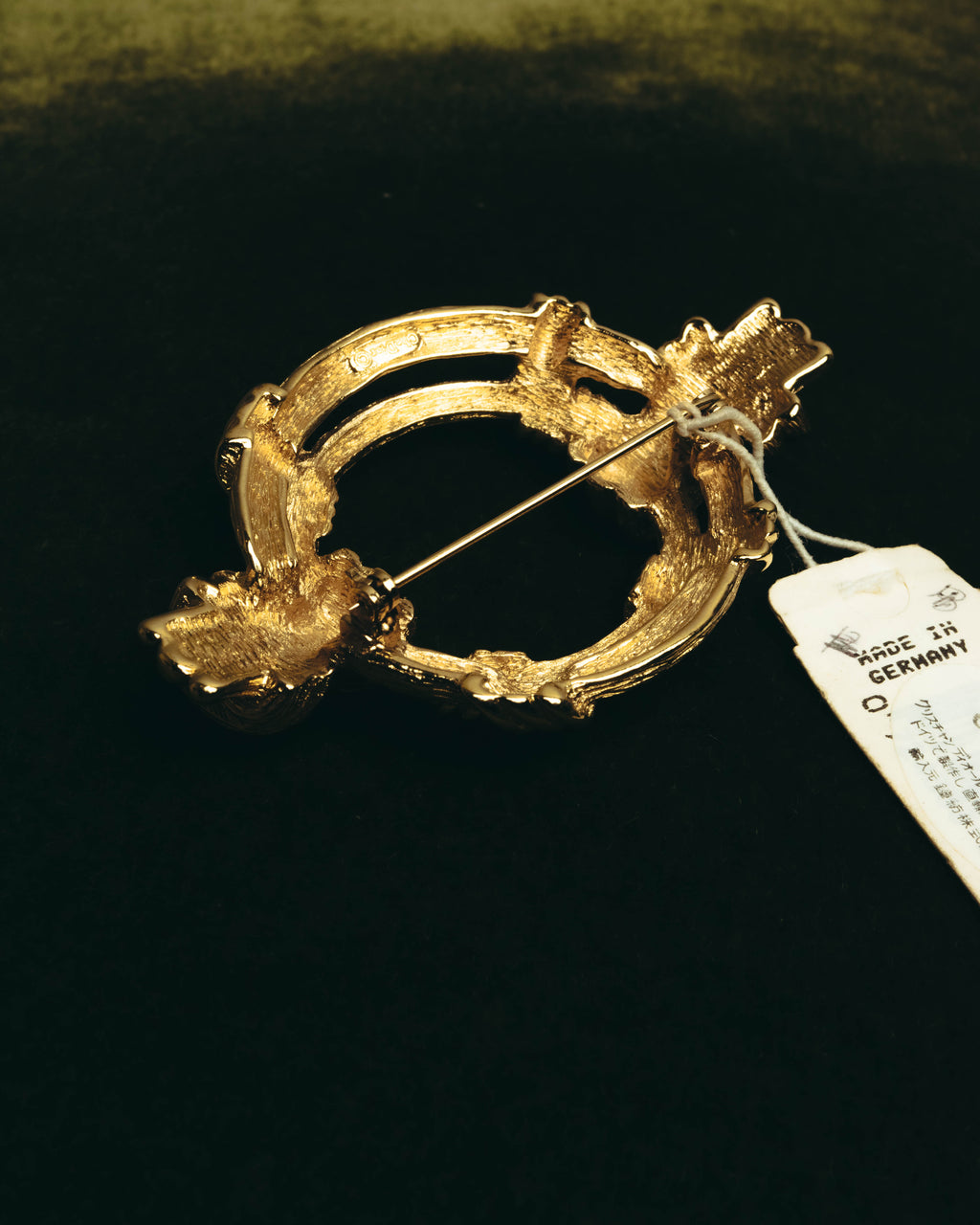 "Christian Dior" 80's-90's Sculptural gold tone ribbon brooch