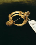 "Christian Dior" 80's-90's Sculptural gold tone ribbon brooch