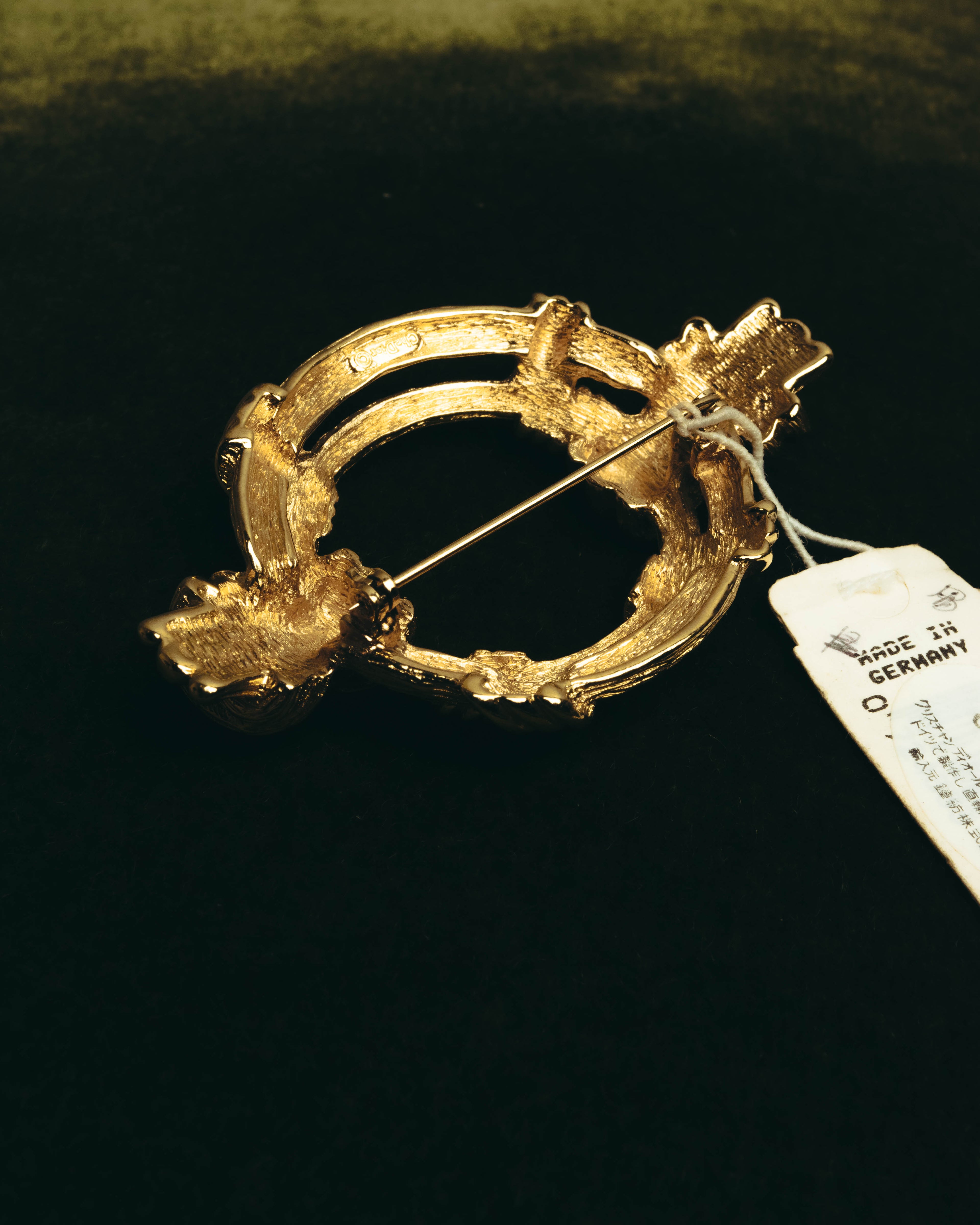 "Christian Dior" 80's-90's Sculptural gold tone ribbon brooch