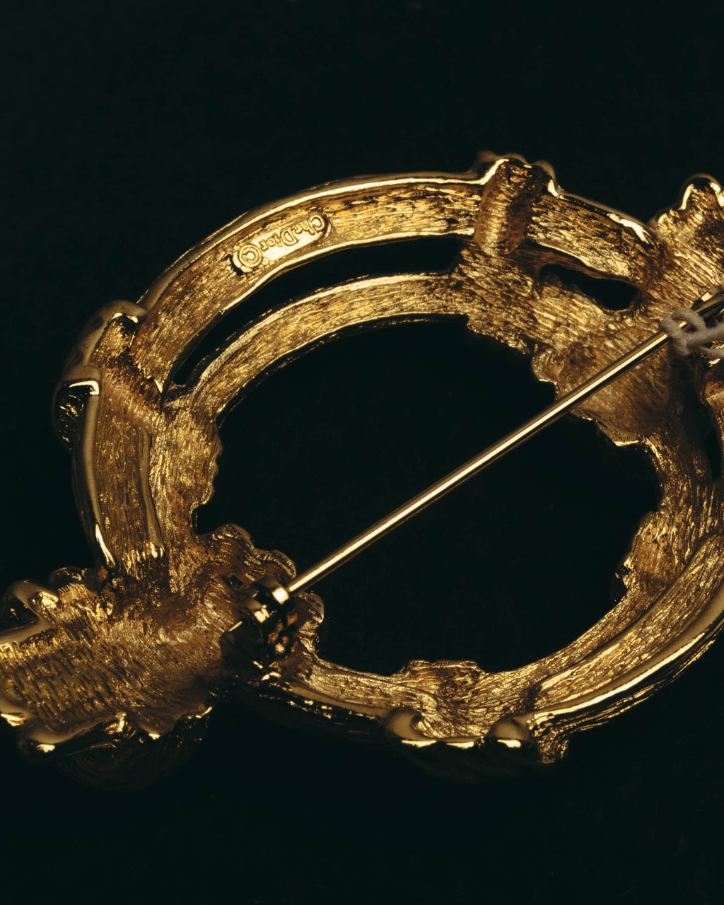 "Christian Dior" 80's-90's Sculptural gold tone ribbon brooch