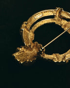 "Christian Dior" 80's-90's Sculptural gold tone ribbon brooch