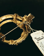"Christian Dior" 80's-90's Sculptural gold tone ribbon brooch
