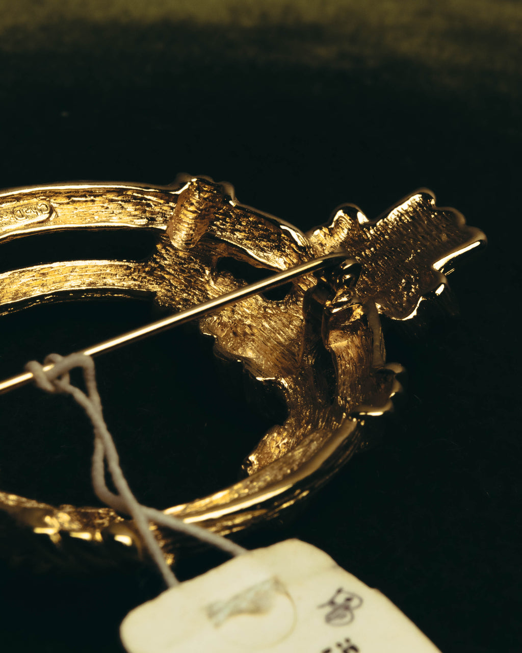 "Christian Dior" 80's-90's Sculptural gold tone ribbon brooch