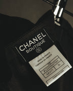 CHANEL BOUTIQUEのブランドタグと、99P・サイズ36・MADE IN FRANCE表記を確認できる品質タグのカット。
