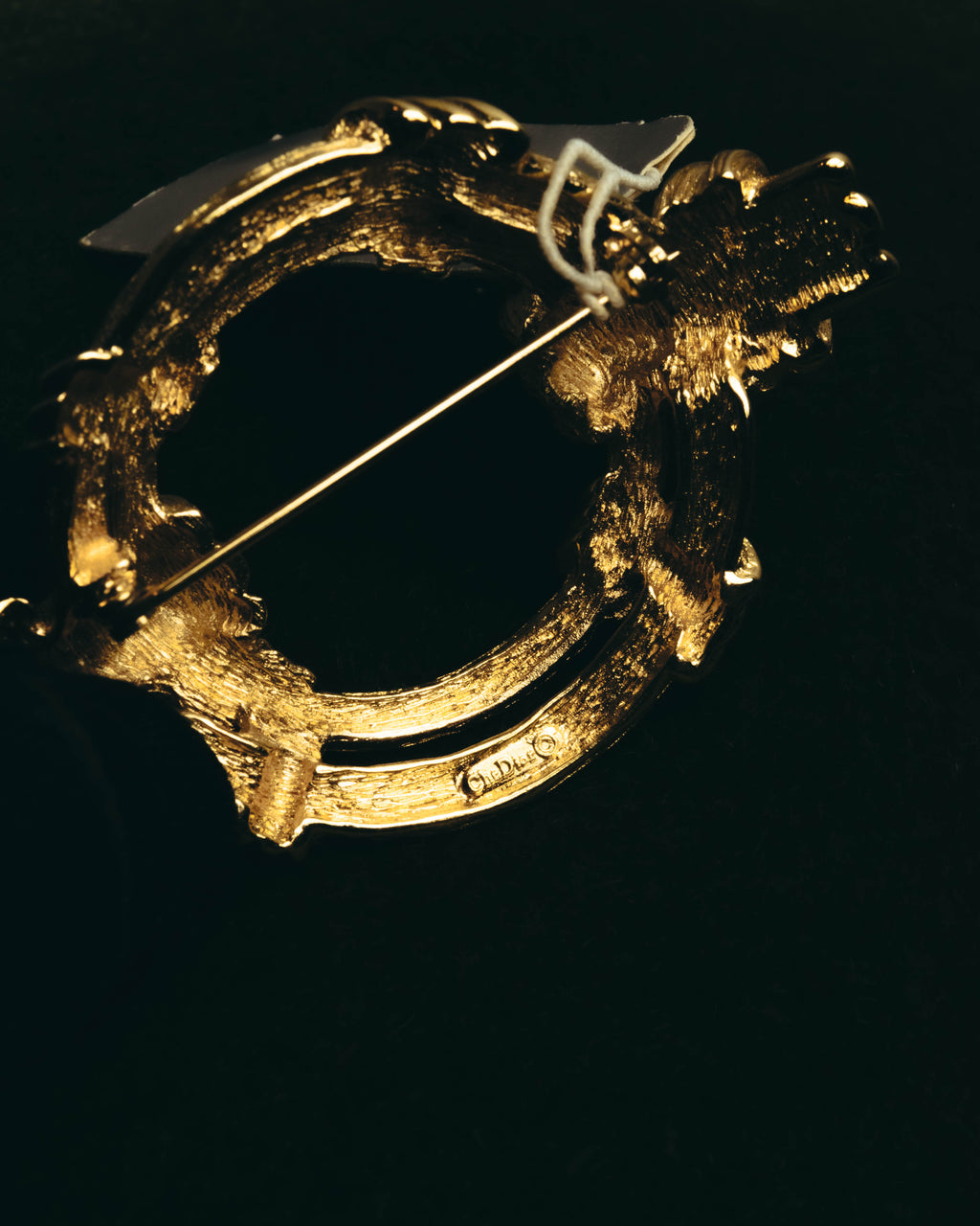"Christian Dior" 80's-90's Sculptural gold tone ribbon brooch