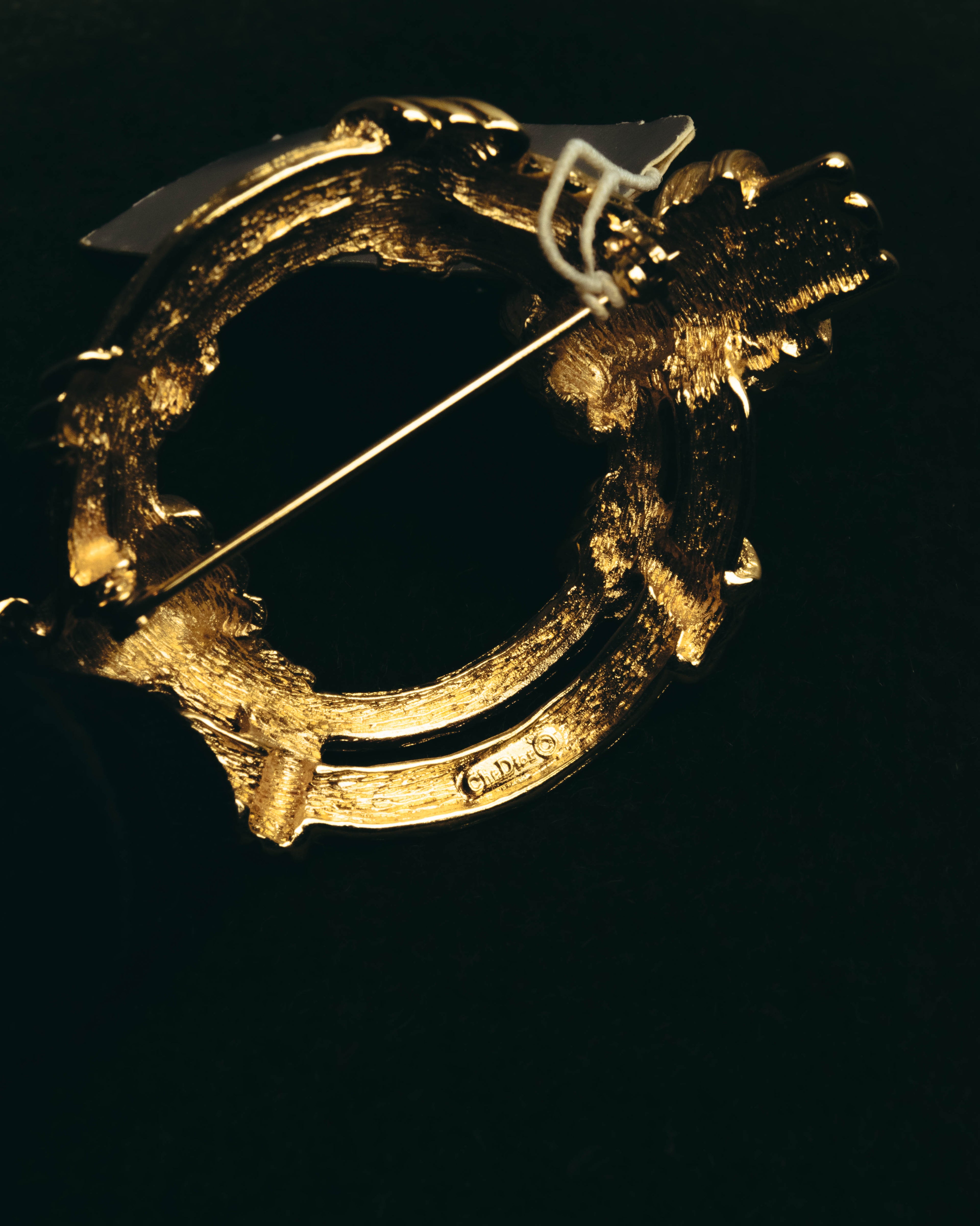 "Christian Dior" 80's-90's Sculptural gold tone ribbon brooch