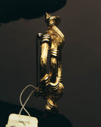 "Christian Dior" 80's-90's Sculptural gold tone ribbon brooch