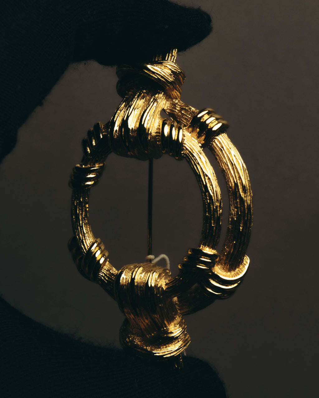 "Christian Dior" 80's-90's Sculptural gold tone ribbon brooch