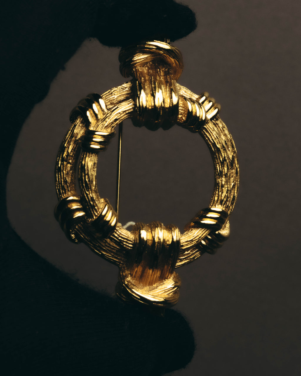 "Christian Dior" 80's-90's Sculptural gold tone ribbon brooch