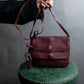 "Cartier" Texture changing bordeaux colored leather shoulder bag