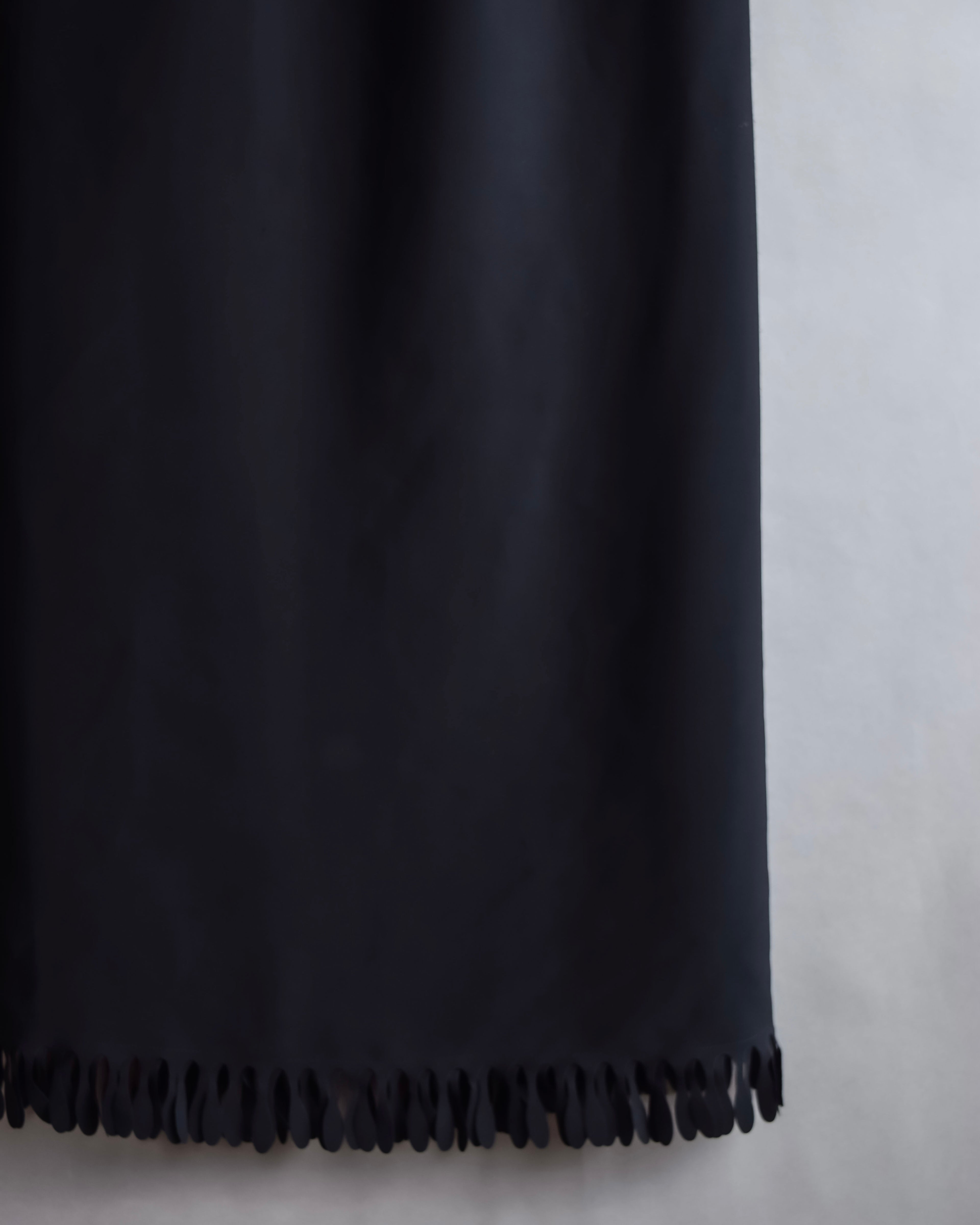 "ISSEY MIYAKE" Organic cutout fringe wrap skirt