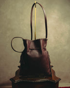 “YVES SAINT LAURENT“ 90’s-00’s Leather drawstring shoulder bag
