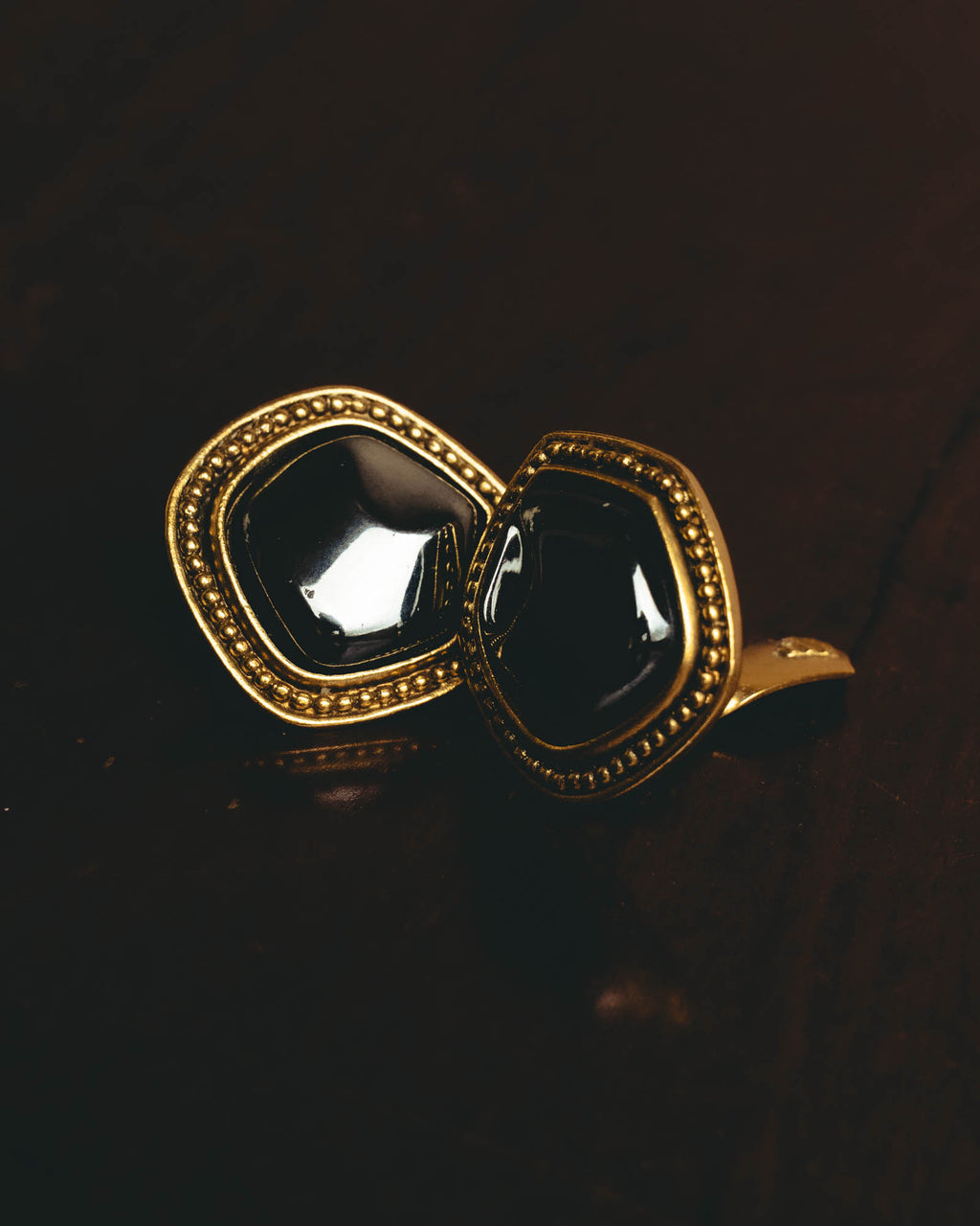 "Yves Saint Laurent" 80's-90's Sculptural black cabochon clip-on earrings