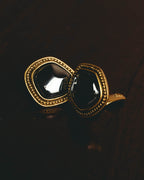 "Yves Saint Laurent" 80's-90's Sculptural black cabochon clip-on earrings