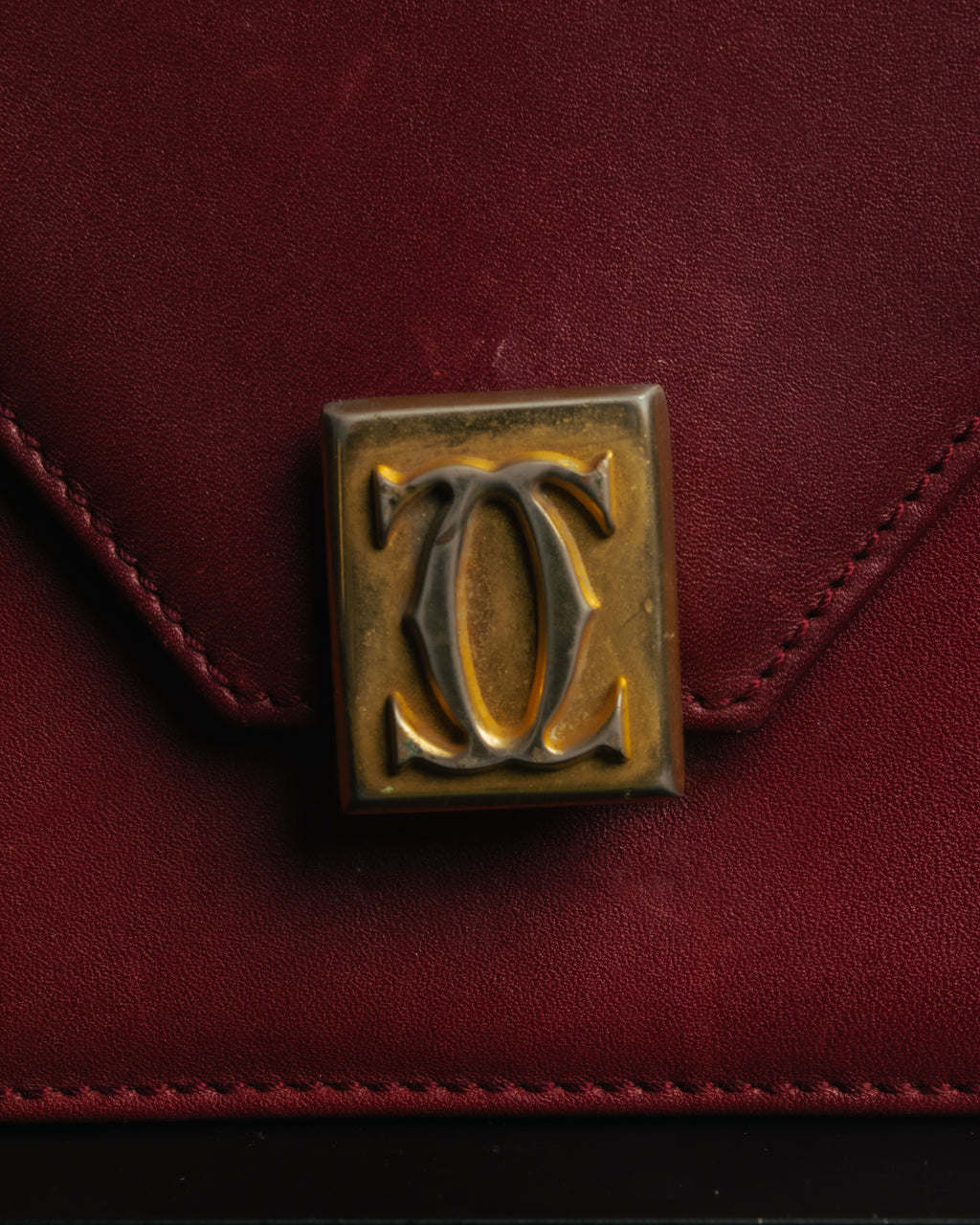 “Cartier” 80’s-90’s Must de Cartier burgundy leather shoulder bag