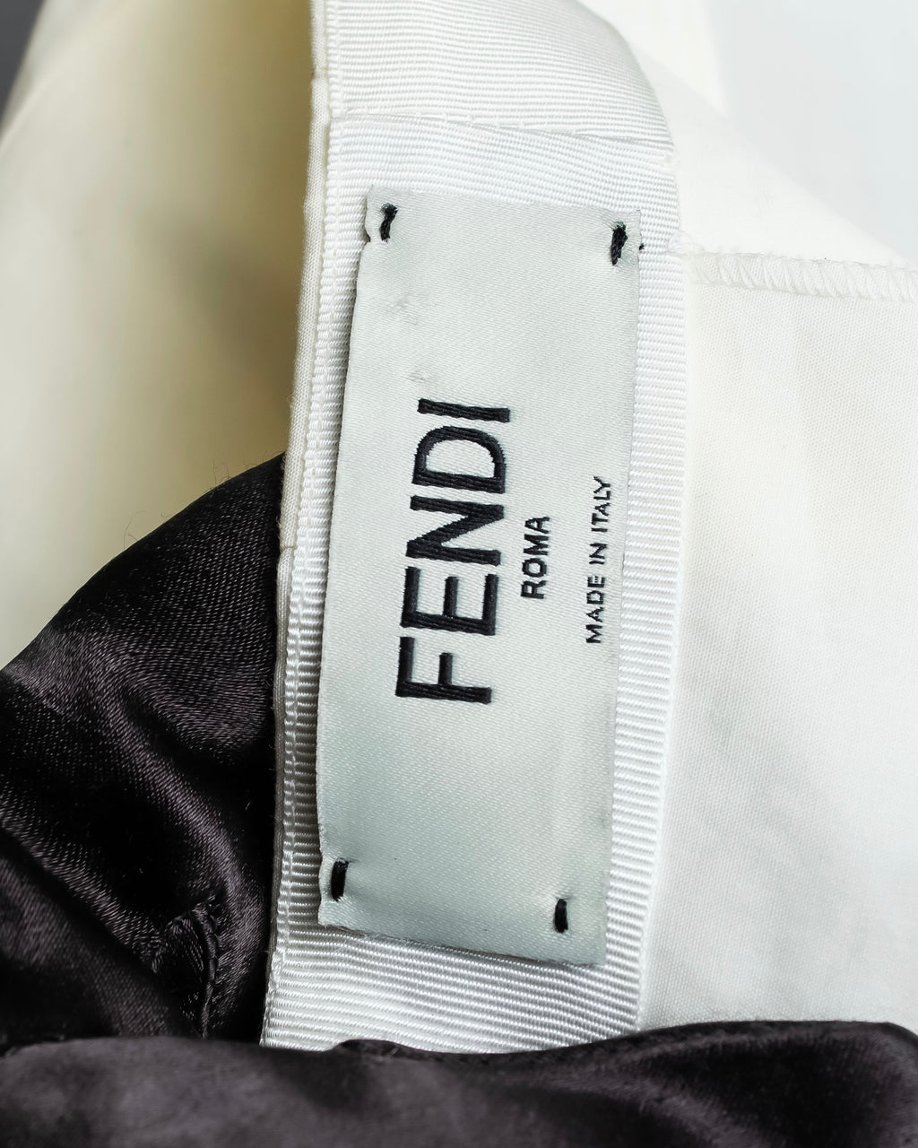 "FENDI" hole pattern and tack designed skirt