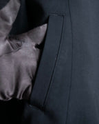 “ISSEY MIYAKE” Chin belt designed stand collar jacket