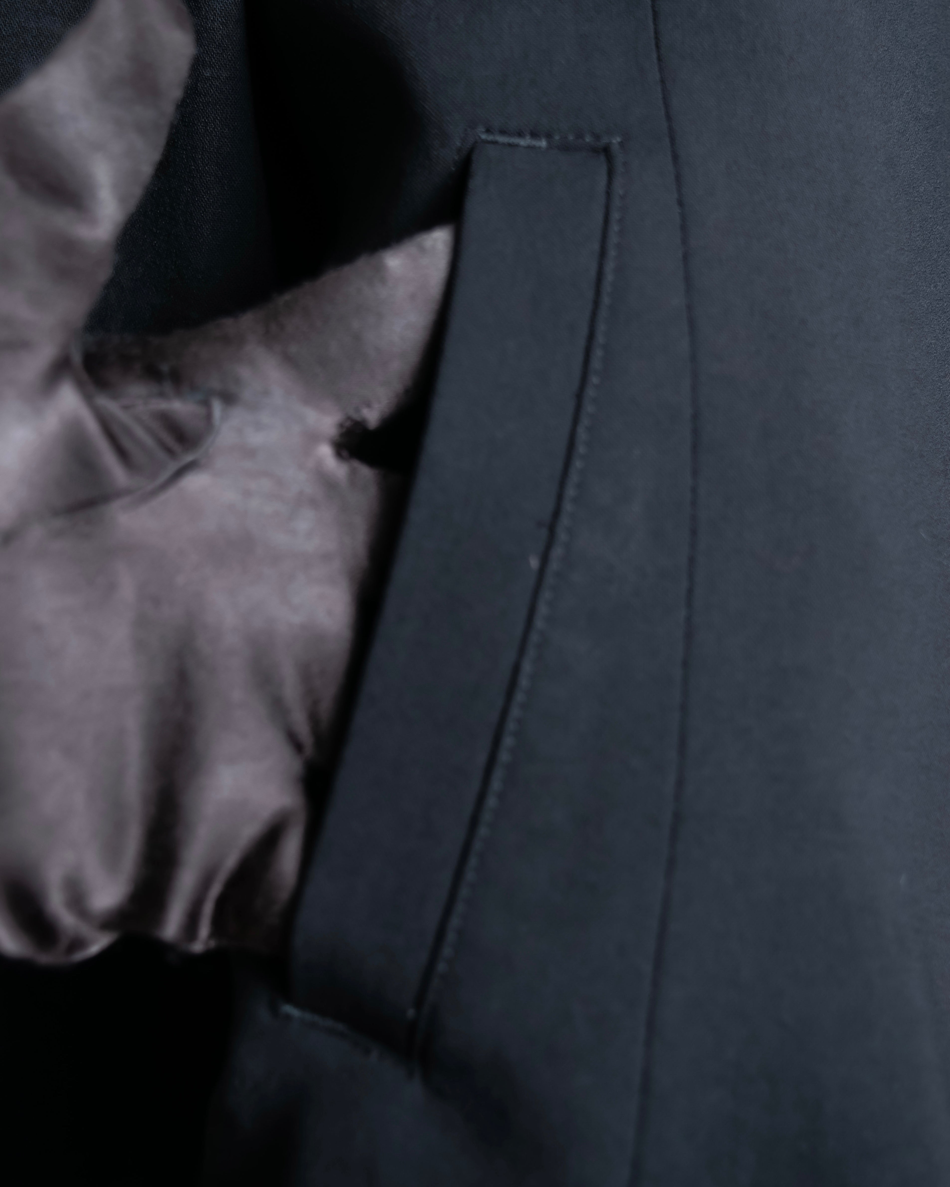 “ISSEY MIYAKE” Chin belt designed stand collar jacket