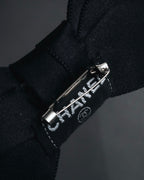 "CHANEL" 90’s black satin and grosgrain ribbon brooch