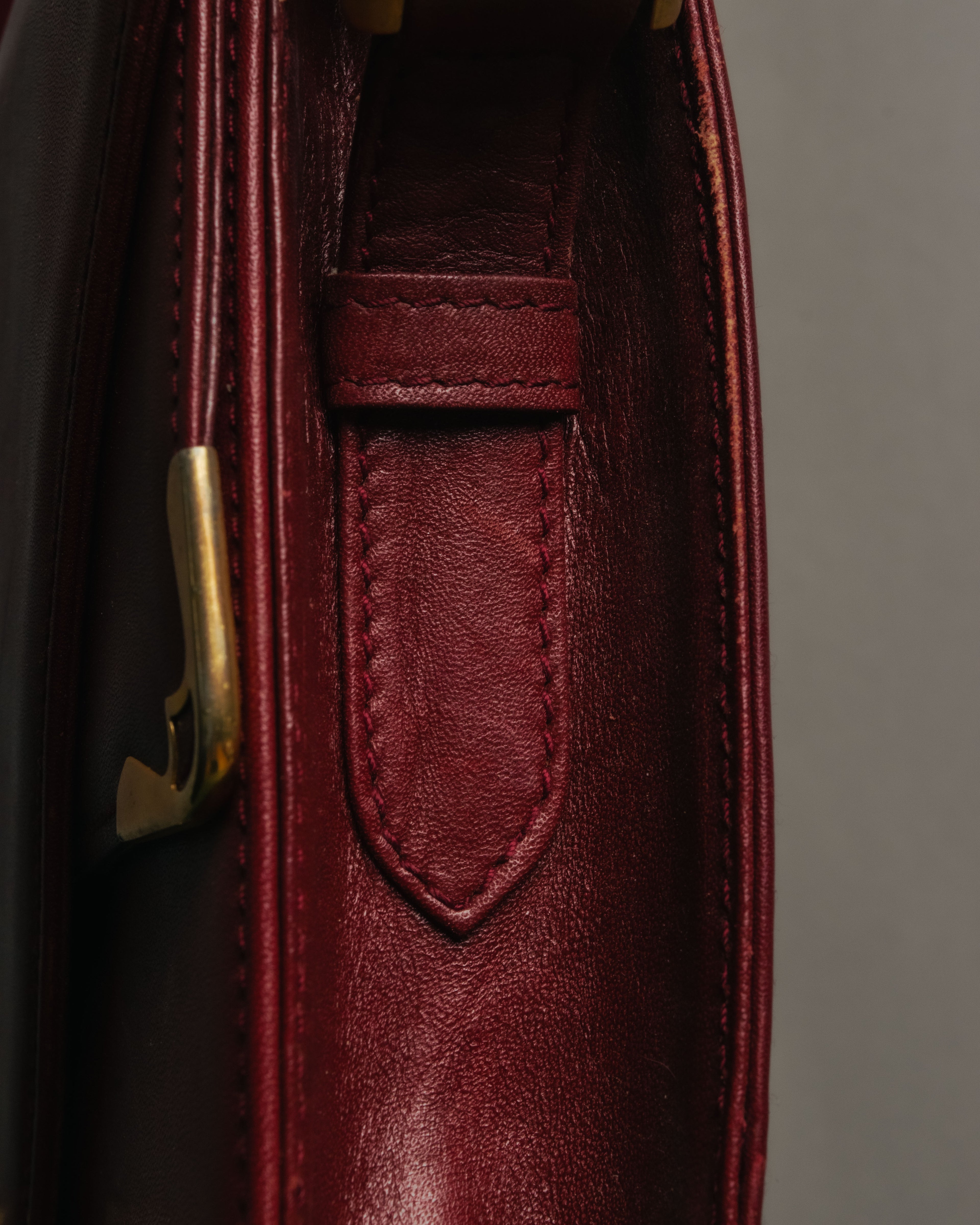“Cartier” 80’s-90’s Must de Cartier burgundy leather shoulder bag