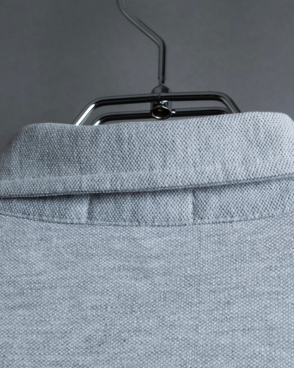 "BURBERRY" Knight logo engraved metal button polo shirt