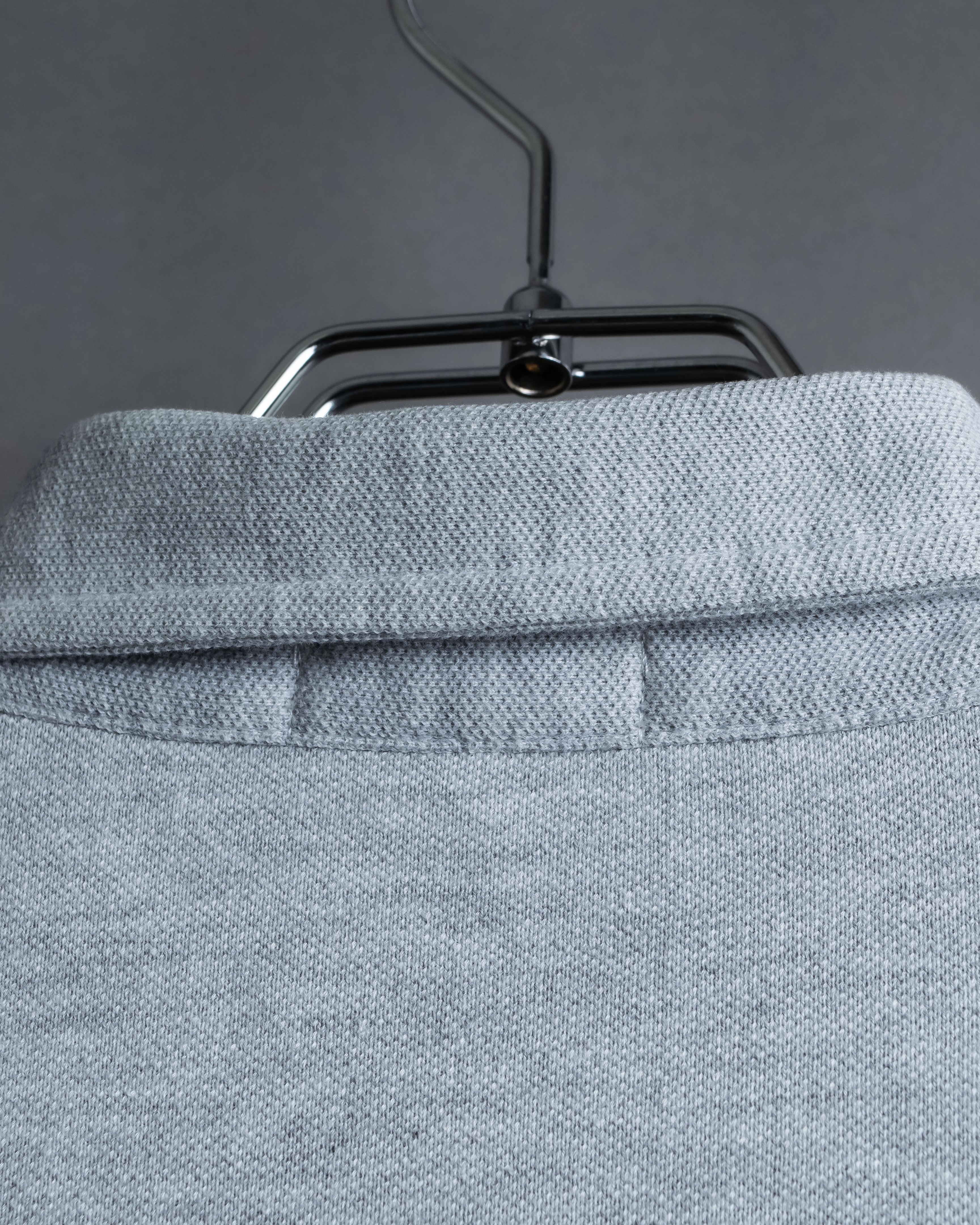 "BURBERRY" Knight logo engraved metal button polo shirt