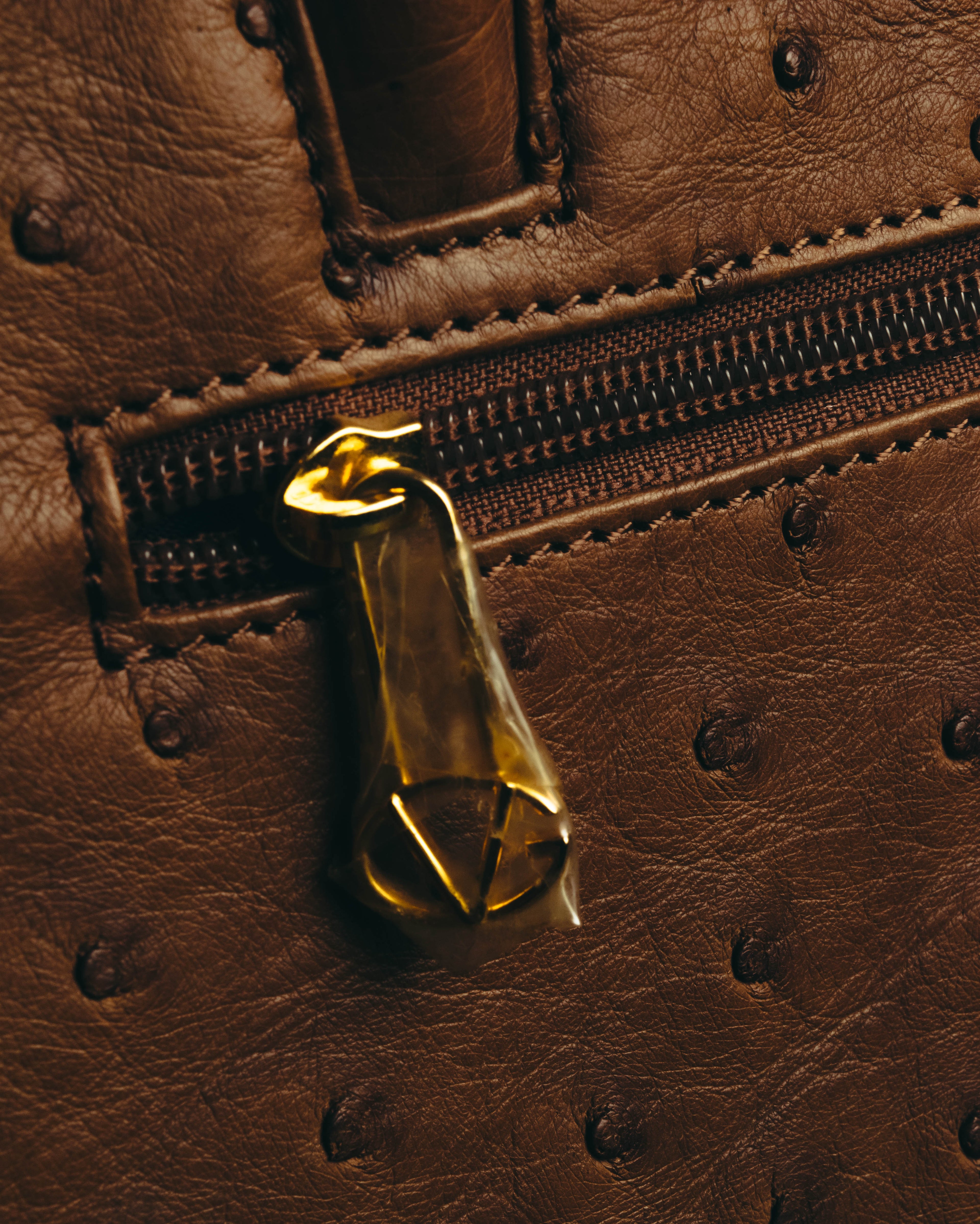 “GIOVANNI VALENTINO” Structured ostrich top handle bag