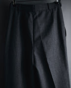 "CHANEL" high-waisted pleated trousers with signature gold button