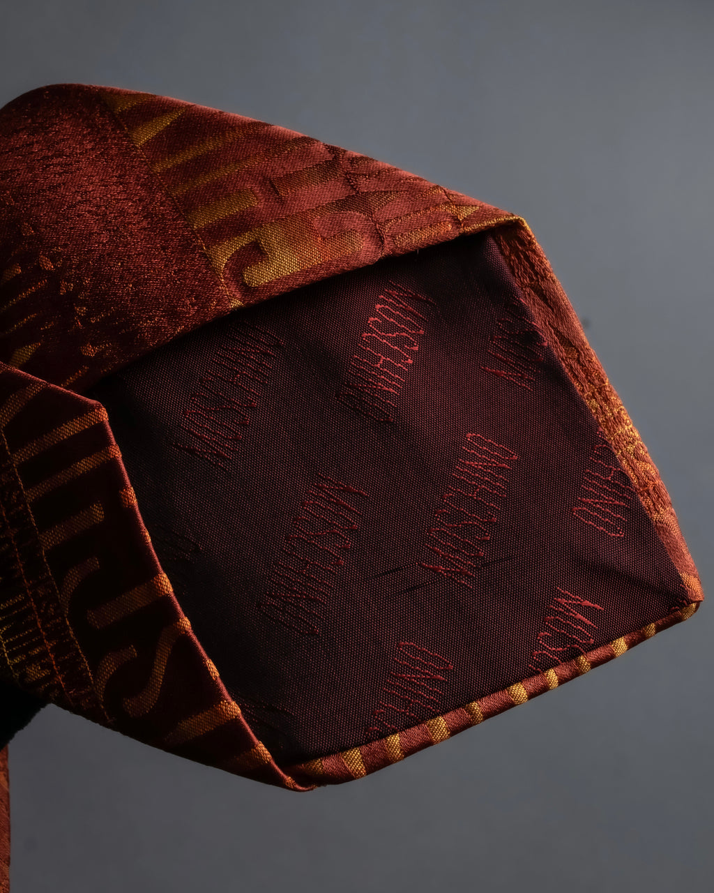 "MOSCHINO" Logo engraved patterned glossy silk necktie