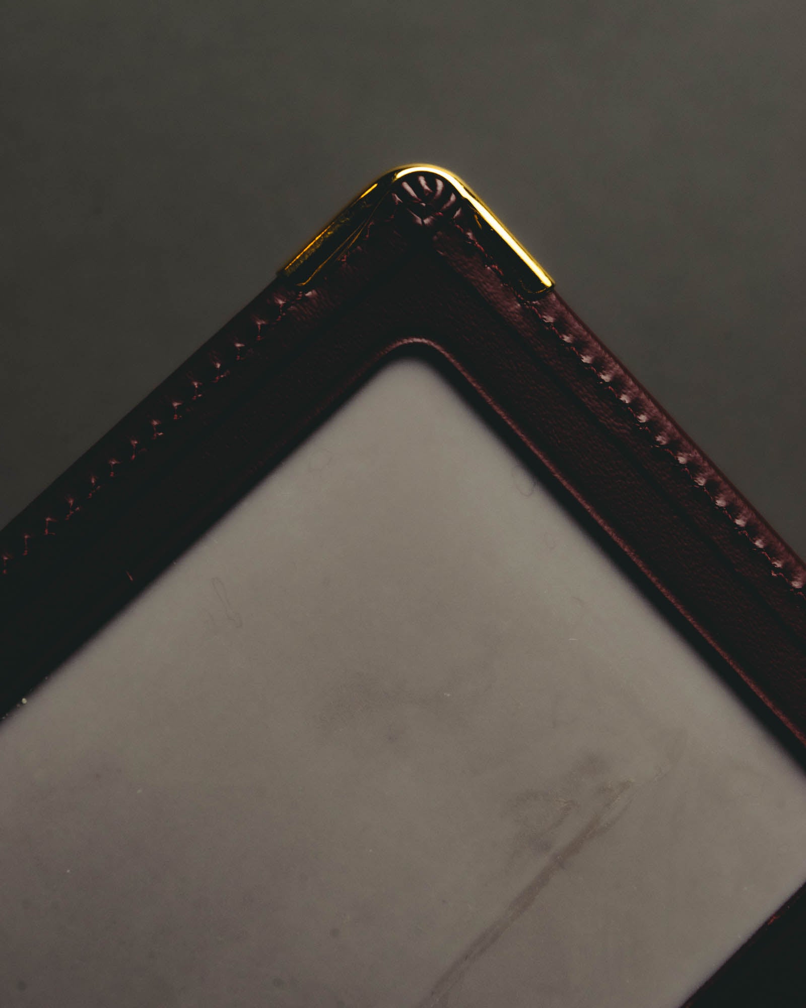 “Cartier” 90’s Must de Cartier burgundy embossed leather bifold wallet