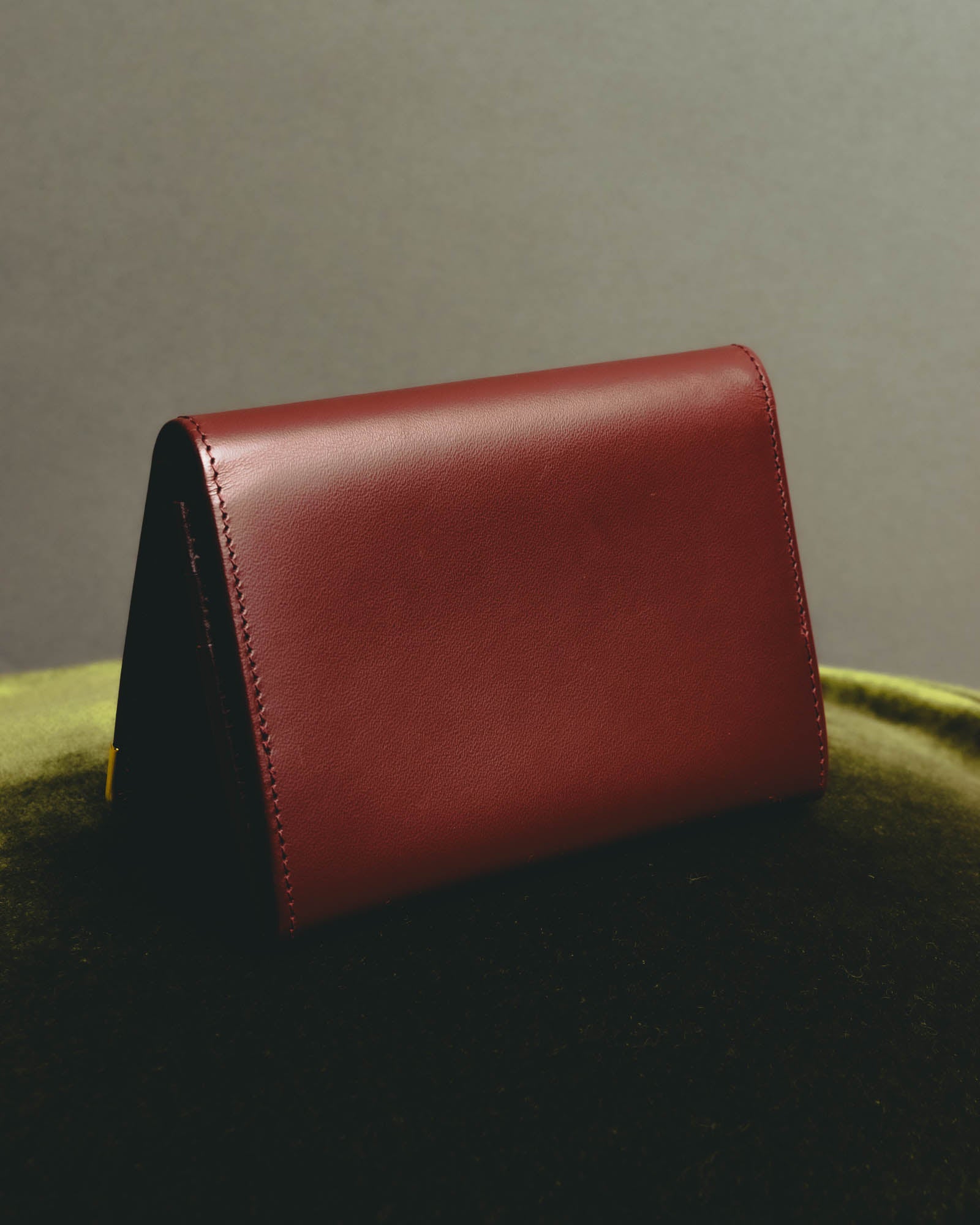 “Cartier” 90’s Must de Cartier burgundy embossed leather bifold wallet